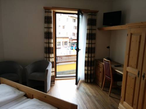 Imagen de la habitación del Hotel Terminus, SAMEDAN . Foto 3
