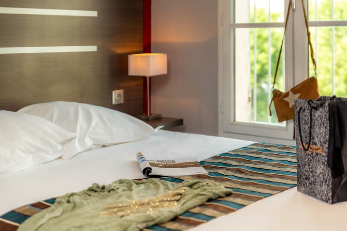 Imagen de la habitación del Hotel Terminus Saint Charles. Foto 5