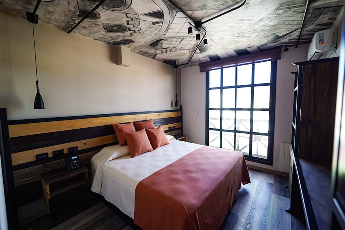 Imagen de la habitación del Hotel Terra Firma Boutique. Foto 11