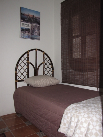 Imagen de la habitación del Hotel Terra Maya Guest House. Foto 5