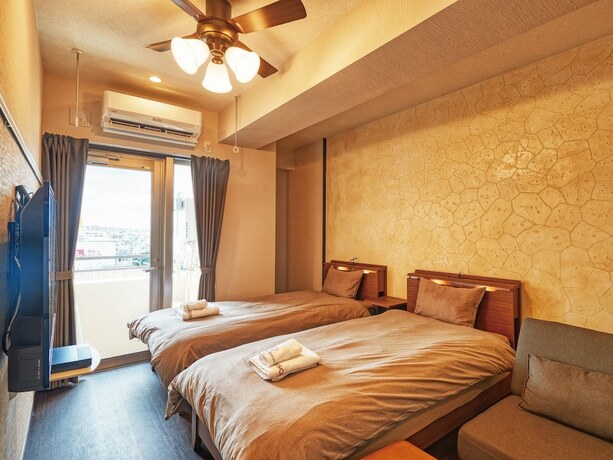 Imagen de la habitación del Hotel Terrace Resort Mihama. Foto 20