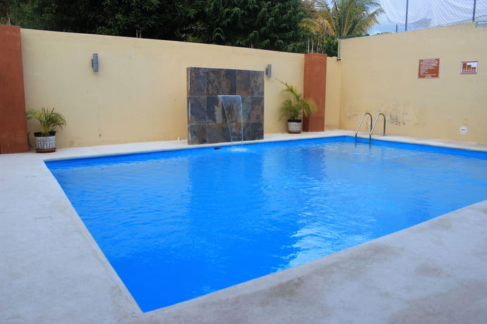 Imagen de la habitación del Hotel Terracota Corner Room. Foto 9