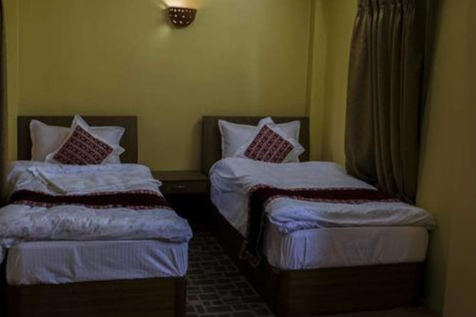 Imagen de la habitación del Hotel Terracotta And Rooftop Restaurant. Foto 11