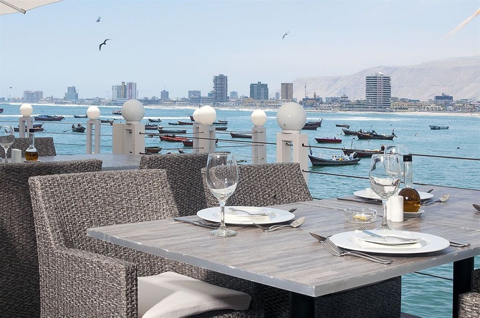 Imagen del bar/restaurante del Hotel Terrado Suites Iquique. Foto 4