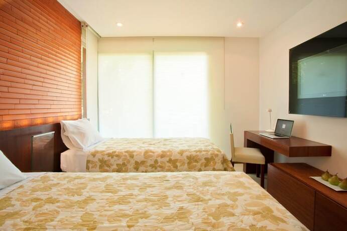 Imagen de la habitación del Hotel Terramia Resort. Foto 18