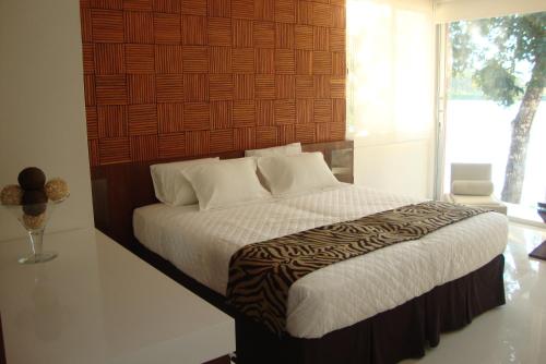 Imagen de la habitación del Hotel Terramia Resort. Foto 11