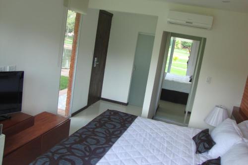 Imagen de la habitación del Hotel Terramia Resort. Foto 12