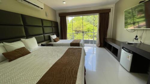 Imagen de la habitación del Hotel Terramia Resort. Foto 19