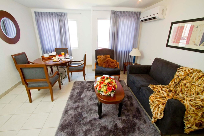 Imagen de la habitación del Hotel Terranova Suites. Foto 7