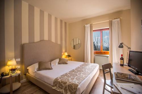 Imagen de la habitación del Hotel Terre Di Casole. Foto 3