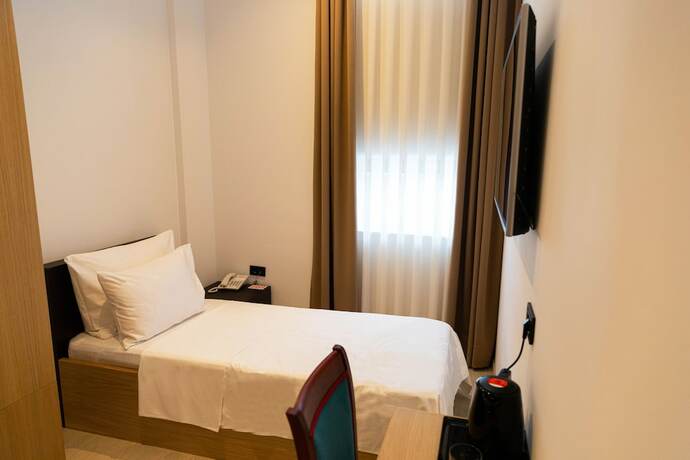 Imagen de la habitación del Hotel Tesara. Foto 19