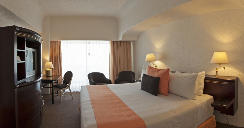 Imagen de la habitación del Hotel Tesoro Manzanillo All Inclusive. Foto 8