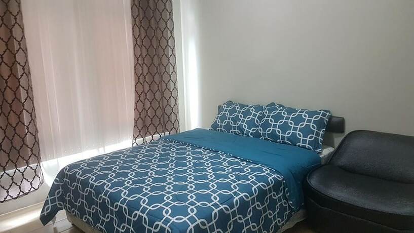 Imagen de la habitación del Hotel Tess And Tessha Condotel. Foto 19