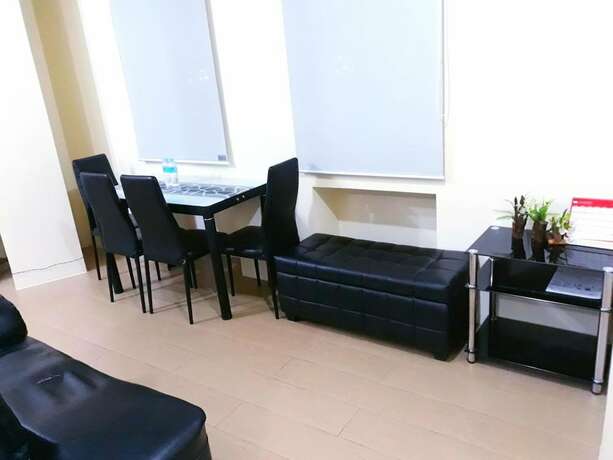 Imagen de la habitación del Hotel Tess And Tessha Condotel. Foto 22