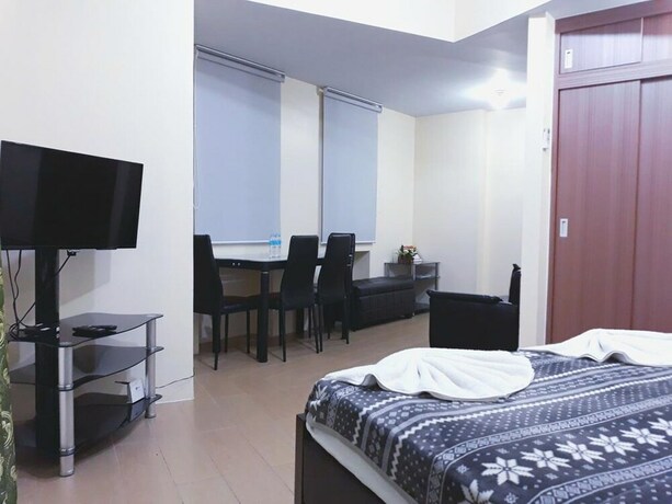 Imagen de la habitación del Hotel Tess And Tessha Condotel. Foto 24