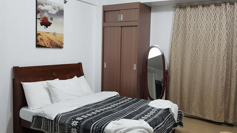 Imagen de la habitación del Hotel Tess And Tessha Condotel. Foto 27