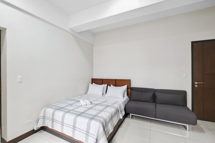 Imagen de la habitación del Hotel Tess And Tessha Condotel. Foto 28