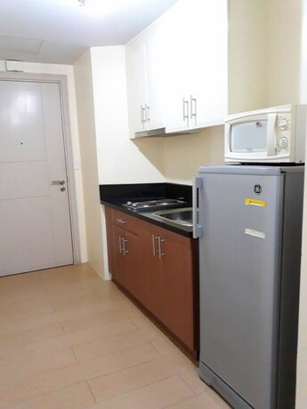 Imagen de la habitación del Hotel Tess And Tessha Condotel. Foto 29