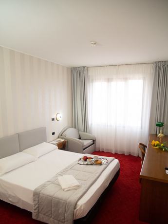 Imagen de la habitación del Hotel Tessarin. Foto 7