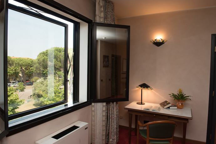 Imagen de la habitación del Hotel Tessarin. Foto 13