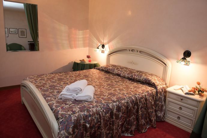 Imagen de la habitación del Hotel Tessarin. Foto 18