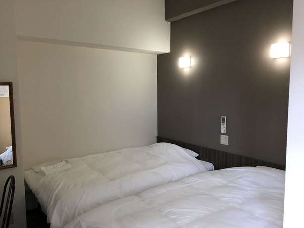 Imagen de la habitación del Hotel Tetora Asahikawa Station. Foto 5