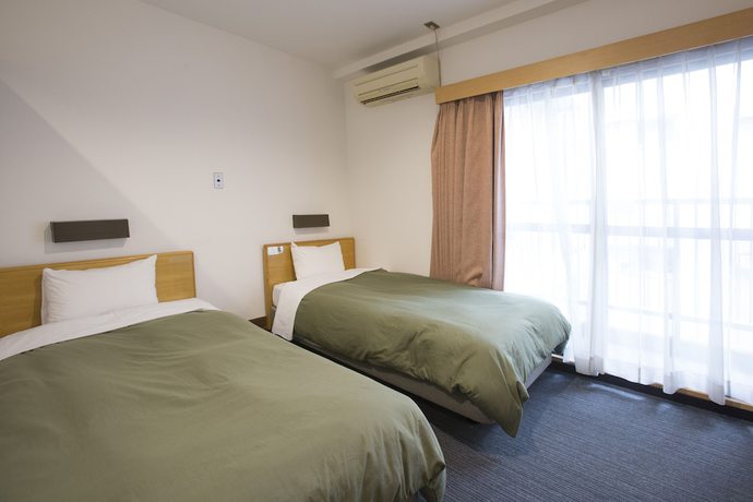 Imagen de la habitación del Hotel Tetora Ikebukuro. Foto 12