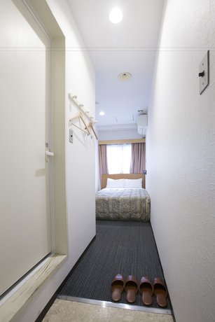 Imagen de la habitación del Hotel Tetora Ikebukuro. Foto 13