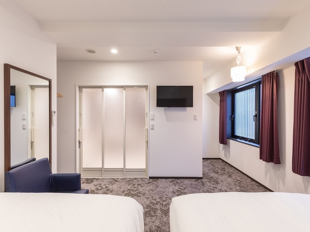 Imagen de la habitación del Hotel Tetora Kyoto Station. Foto 13