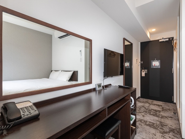 Imagen de la habitación del Hotel Tetora Kyoto Station. Foto 17