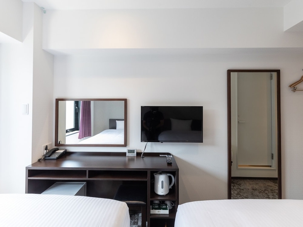 Imagen de la habitación del Hotel Tetora Kyoto Station. Foto 18