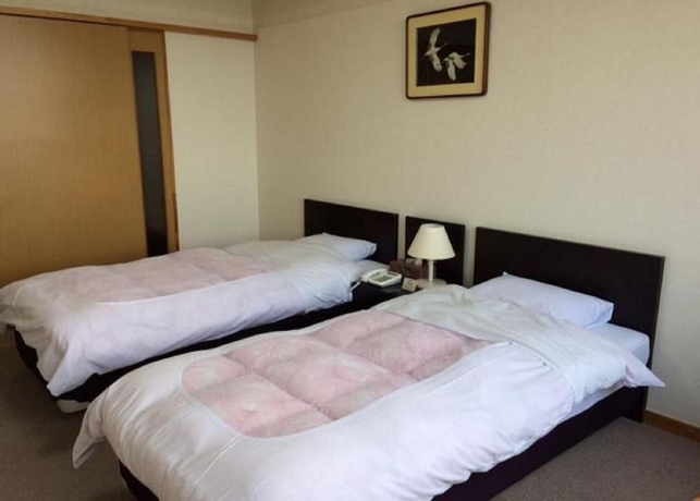 Imagen de la habitación del Hotel Tetora Resort Tsuruoka. Foto 10