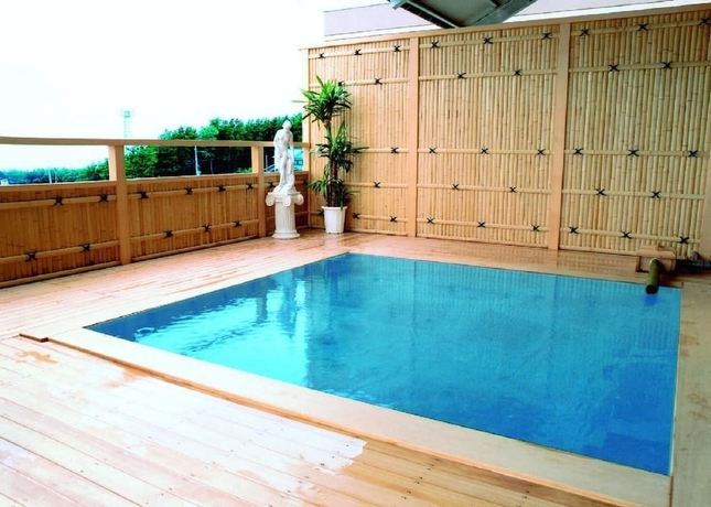 Imagen de la piscina del Hotel Tetora Resort Tsuruoka. Foto 18