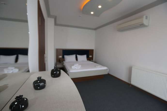 Imagen de la habitación del Hotel Tevetoglu. Foto 10