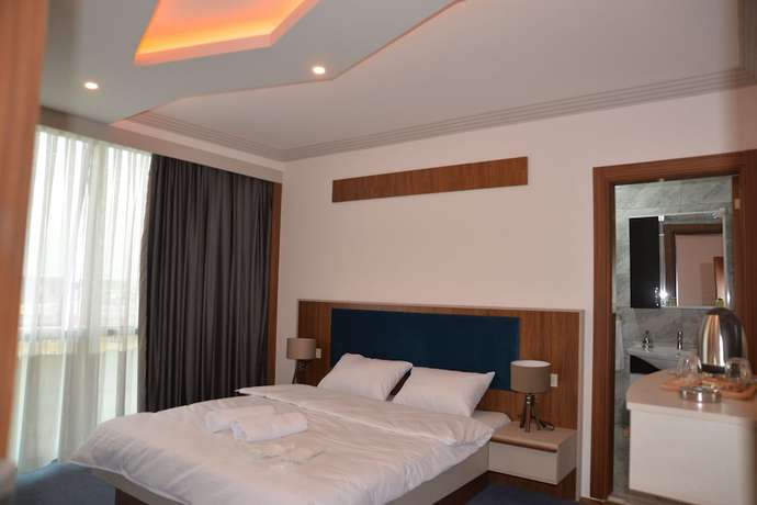 Imagen de la habitación del Hotel Tevetoglu. Foto 14