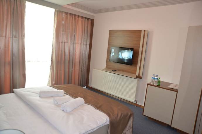 Imagen de la habitación del Hotel Tevetoglu. Foto 16