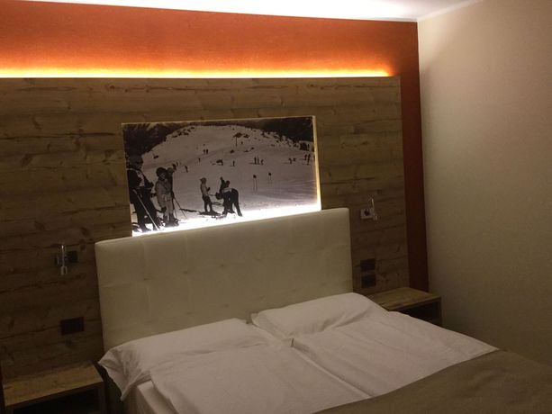 Imagen del bar/restaurante del Hotel Tevini Dolomites Charming. Foto 4