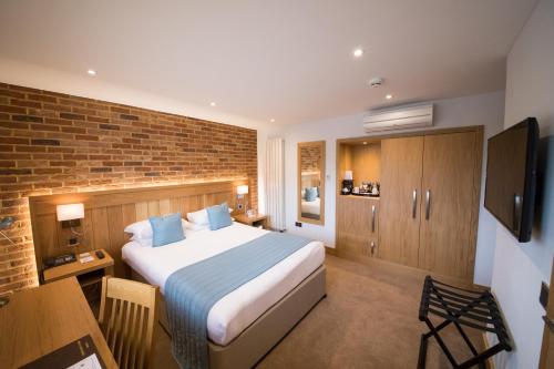 Imagen de la habitación del Hotel Tewin Bury Farm. Foto 6