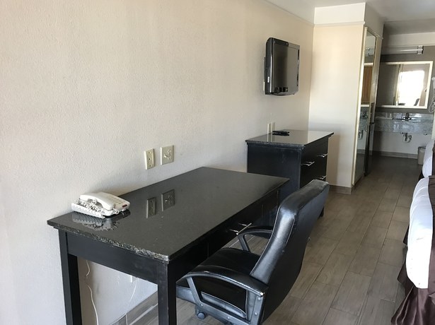 Imagen de la habitación del Hotel Texas Inn And Suites. Foto 12