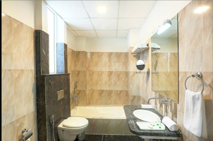 Imagen de la habitación del Hotel Tgi Apple Inn. Foto 19