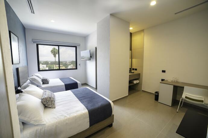 Imagen de la habitación del Hotel Th And Vivienda. Foto 13