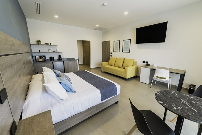 Imagen de la habitación del Hotel Th And Vivienda. Foto 14