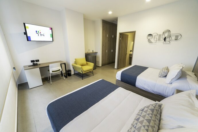 Imagen de la habitación del Hotel Th And Vivienda. Foto 15