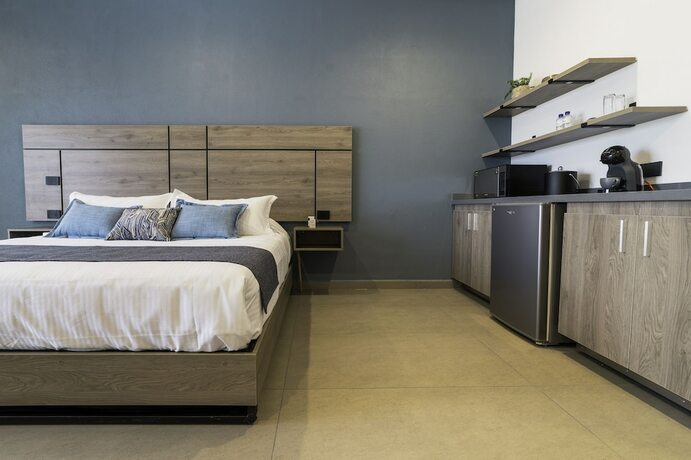 Imagen de la habitación del Hotel Th And Vivienda. Foto 18