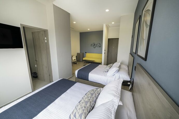 Imagen de la habitación del Hotel Th And Vivienda. Foto 19