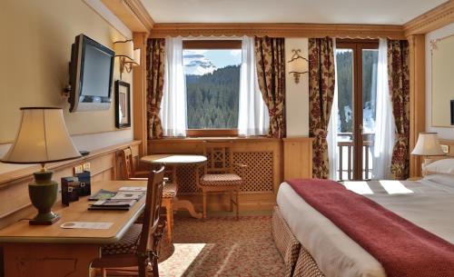 Imagen de la habitación del Hotel Th Madonna Di Campiglio - Golf. Foto 9