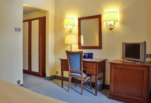 Imagen de la habitación del Hotel Th Madonna Di Campiglio - Golf. Foto 10