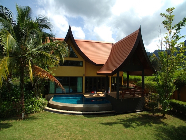 Imagen de la habitación del Hotel Tha Lane Bay Villa. Foto 5