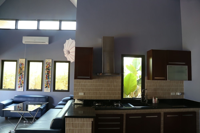 Imagen de la habitación del Hotel Tha Lane Bay Villa. Foto 8