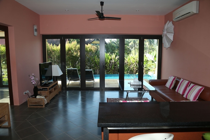 Imagen de la habitación del Hotel Tha Lane Bay Villa. Foto 9